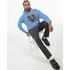 Man wearing blue Men's Urban Teddy Bear Hoodie with colorful teddy bear graphic; 50/50 cotton-polyester blend.
