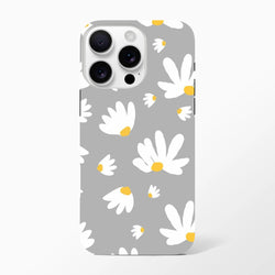 Grey iPhone case featuring a white daisy floral pattern with yellow centers. Botanical phone cover with utilitarian grey tone for street-ready style.
