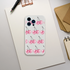 Glitter Ball Cherries phone case in clear, slim protective cover for iPhone 13-16 with pink mirrored cherries design