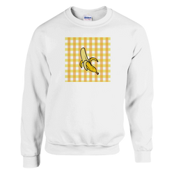 White sweatshirt featuring a retro yellow banana graphic on an orange gingham check background for a cute fruit design.