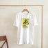 White women's cotton-blend T-shirt with bright yellow lemon graphic and crew neck.