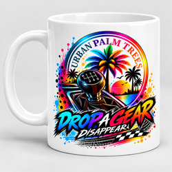 White ceramic mug with colorful car graphic featuring gear, palm trees, and racing text