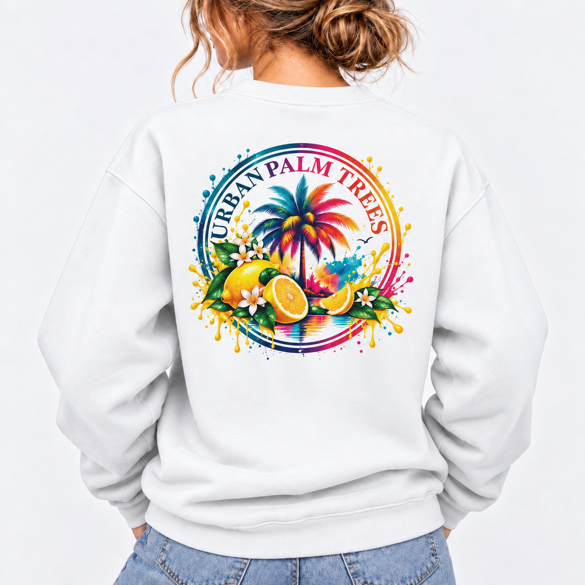 White women's palm tree sweatshirt with colorful tropical fruit back graphic