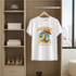 White t-shirt with a colorful graphic design hanging in a wardrobe.