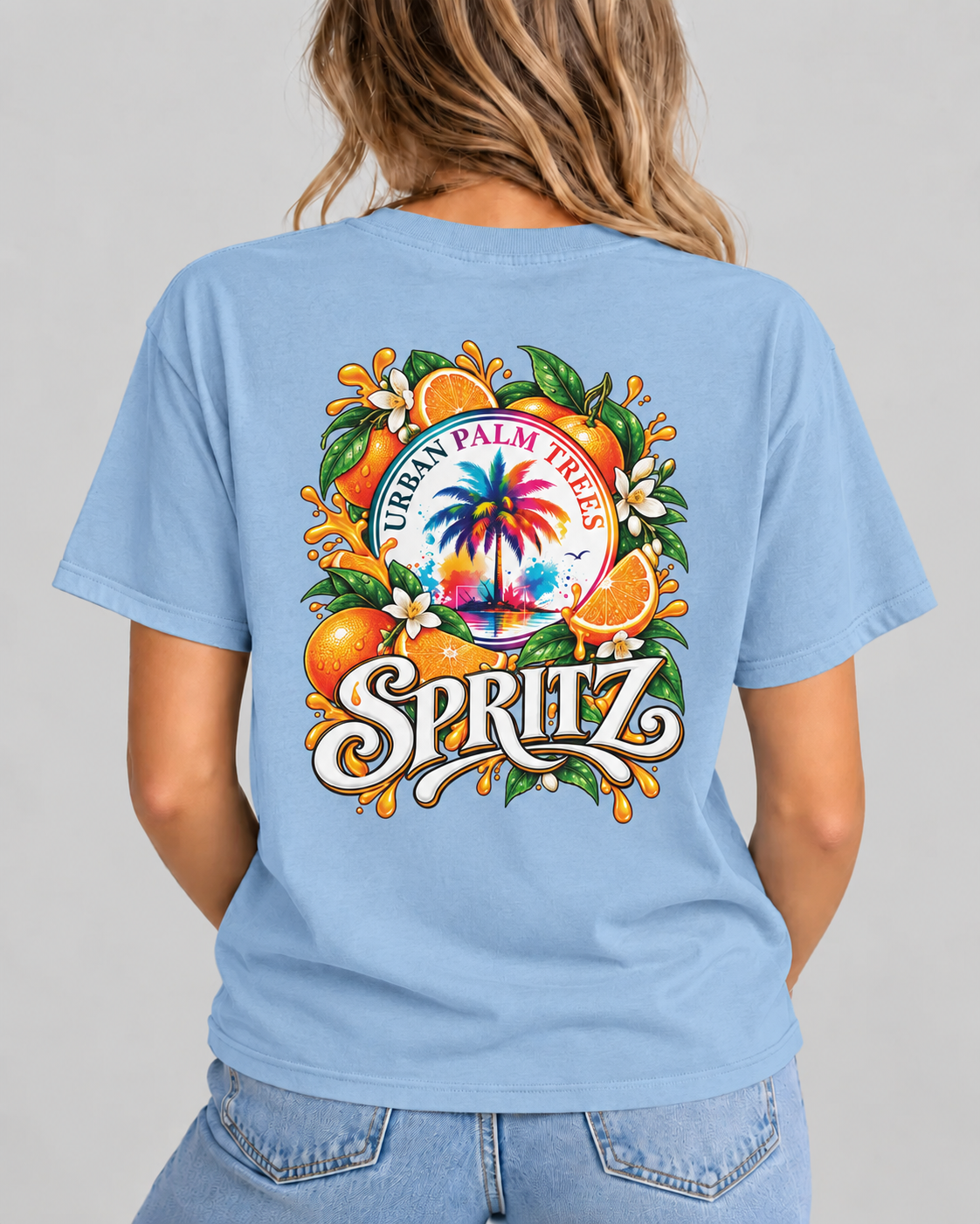 Light blue women's T-shirt with back “URBAN PALM TREES” and “SPRITZ” graphic print
