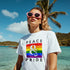 White Pride LGBTQ women's graphic T-shirt with a rainbow Peace & Pride design, soft cotton blend sizes S to XL