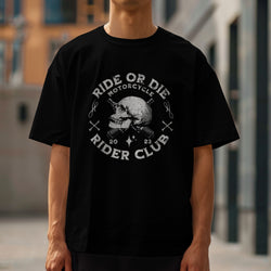 Man wearing black Motorcycle Club graphic T-shirt with skull emblem and ride‑or‑die text.