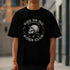 Man wearing black Motorcycle Club graphic T-shirt with skull emblem and ride‑or‑die text.