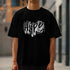 Hype men's graphic T-shirt in black with gray graffiti logo on chest; soft cotton blend, crew neck.