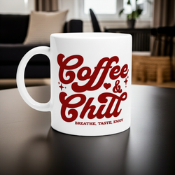 White mug with red text 'Coffee & Chill' on a table in a home setting