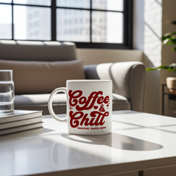 White mug with red text 'Coffee & Chill' on a modern living room table.