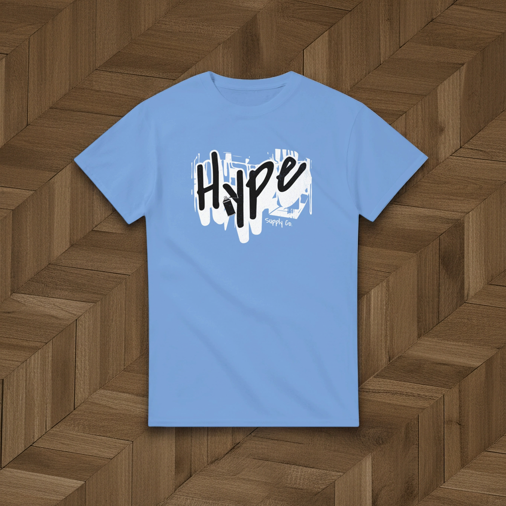 Light blue t-shirt with 'Hype' graphic on a wooden floor