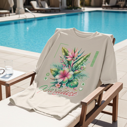 Beige T-Shirt with tropical floral design and 'Paradise' text on a lounge chair by a pool.