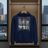Navy blue hoodie with car graphic on a hanger in a wardrobe with cityscape view