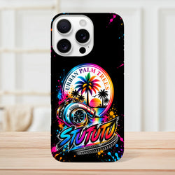 Turbo Petrolhead iPhone case featuring colorful turbocharger, urban palm trees, and retro sunset art with vibrant paint splatters on black.