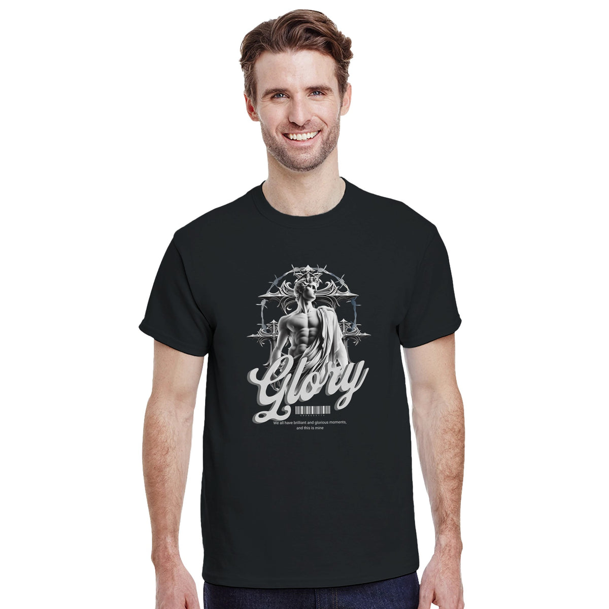 Male model wearing black Gothic Glory graphic T-shirt with silver statue motif and 'Glory' script.