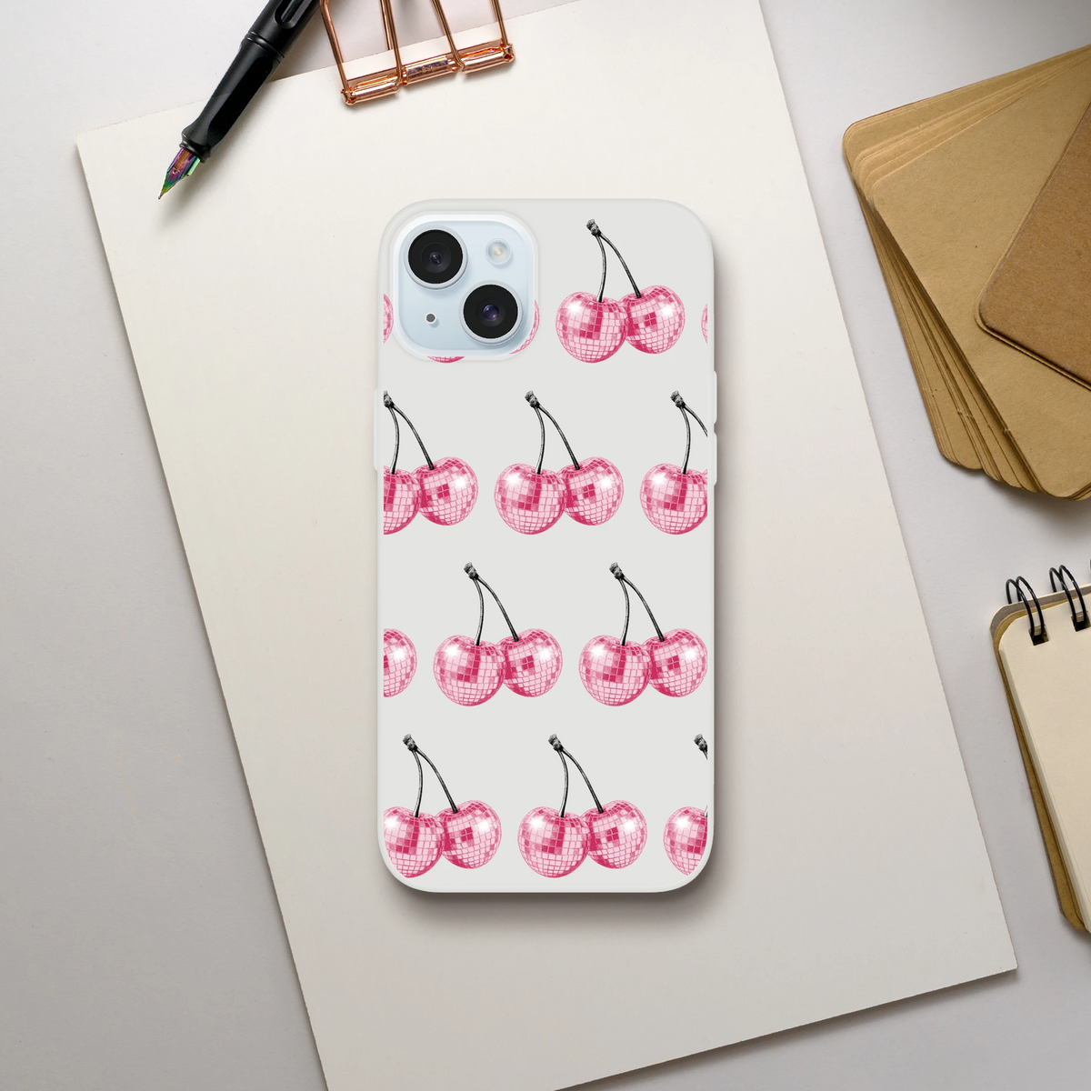 Transparent slim protective iPhone 13-16 case with pink glitter ball cherries pattern.