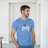 Man modeling a blue Retro Gamer Men's Graphic T-Shirt with pixel-art arcade graphic.