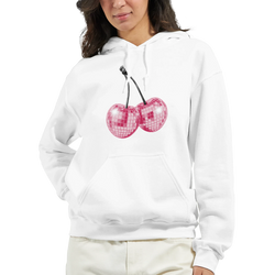 Woman wearing a white cotton-blend hoodie with pink glitter cherries graphic and a front pocket.