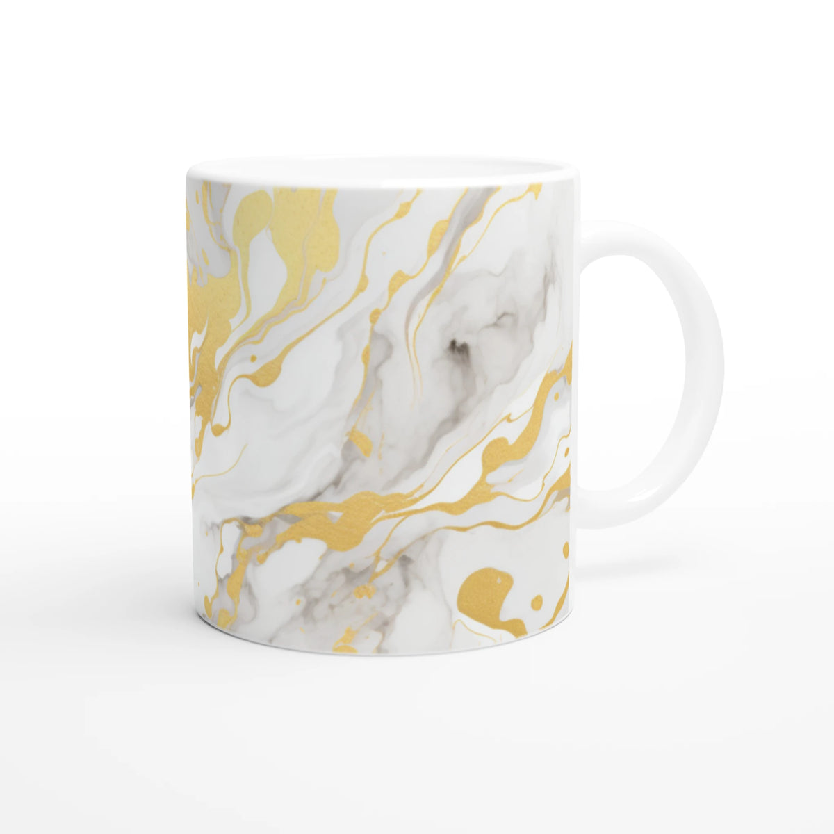 Gold and white marble ceramic mug with abstract gold veining and a white handle.