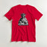 Red cotton blend men's T-shirt with a black-and-white Statue of Liberty DJ graphic spinning on a mixer.