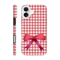 Red gingham iPhone case with a large pink bow. Cute coquette tough phone cover featuring a wraparound checkered print for iOS 13-16 devices.