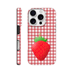 Red gingham iPhone case featuring a large cute strawberry graphic. Tough checkered phone cover for drop protection.