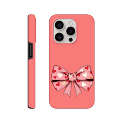 Pink iPhone case featuring a cute coquette bow with heart patterns. Tough protective cover with bold aesthetics for street-smart creators.