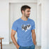 Man wearing Hype men's graphic T-shirt in soft cotton blend, light blue with bold black-and-white logo.