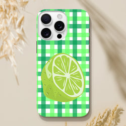Lime green gingham iPhone case featuring a large citrus slice illustration and tough protective design for daily use.