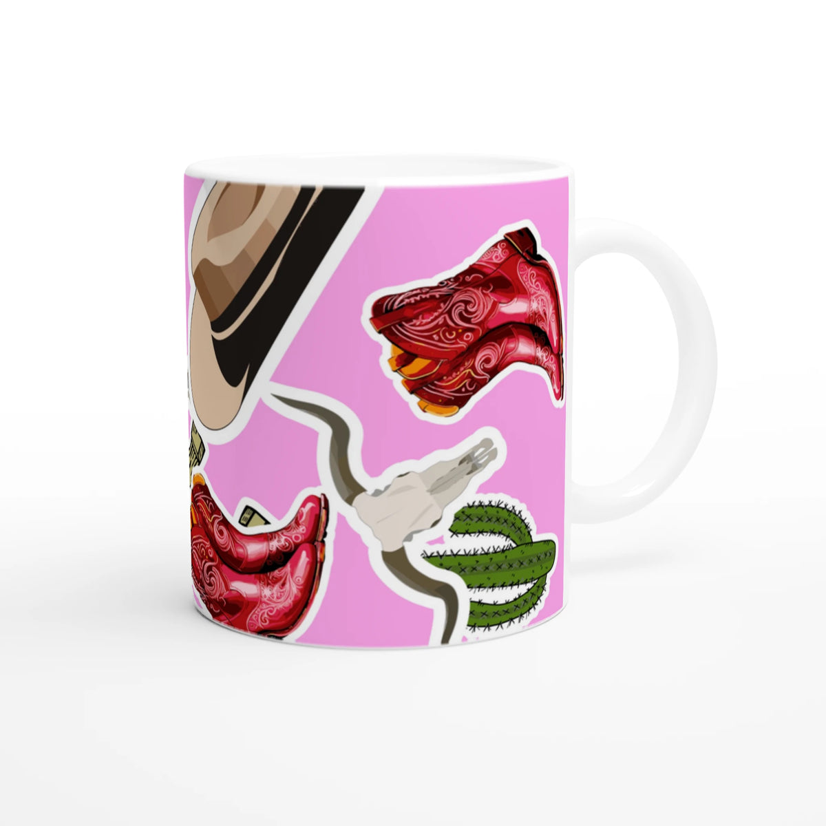 Pink Western Cowboy ceramic mug featuring boots, cactus and horseshoe designs for coffee.