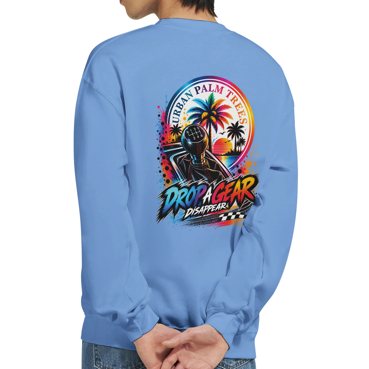 Light blue sweatshirt back with colorful retro graphic featuring a manual shift knob, palm trees, and "Drop A Gear" text.