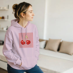 Lavender hoodie featuring a retro cherry graphic on a red gingham square, showcasing vintage fruit pullover style for women.