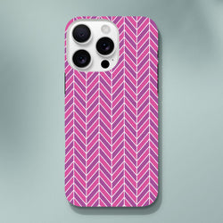 Pink geometric herringbone iPhone case with shock-absorbing TPU protection for daily impact resistance.