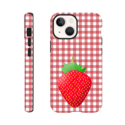 Red checkered iPhone case featuring a large cute strawberry illustration in gingham pattern for drop protection.