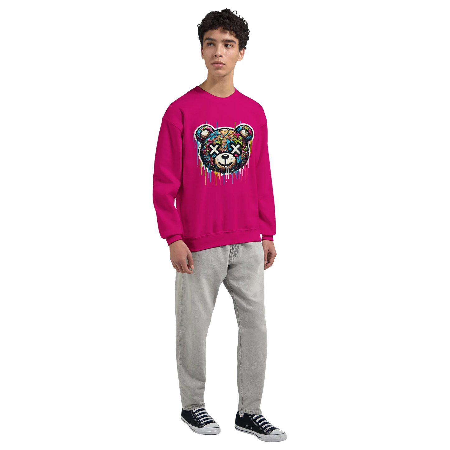 Person wearing a pink men's graphic sweatshirt with a colorful bear design on a white background mid view