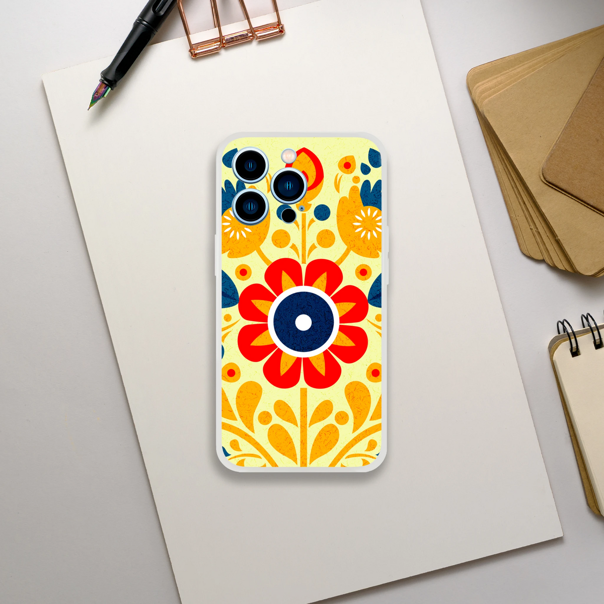 Vintage Floral iPhone Case (13-16) with retro yellow-orange flower motif and blue accents, slim matte TPU cover