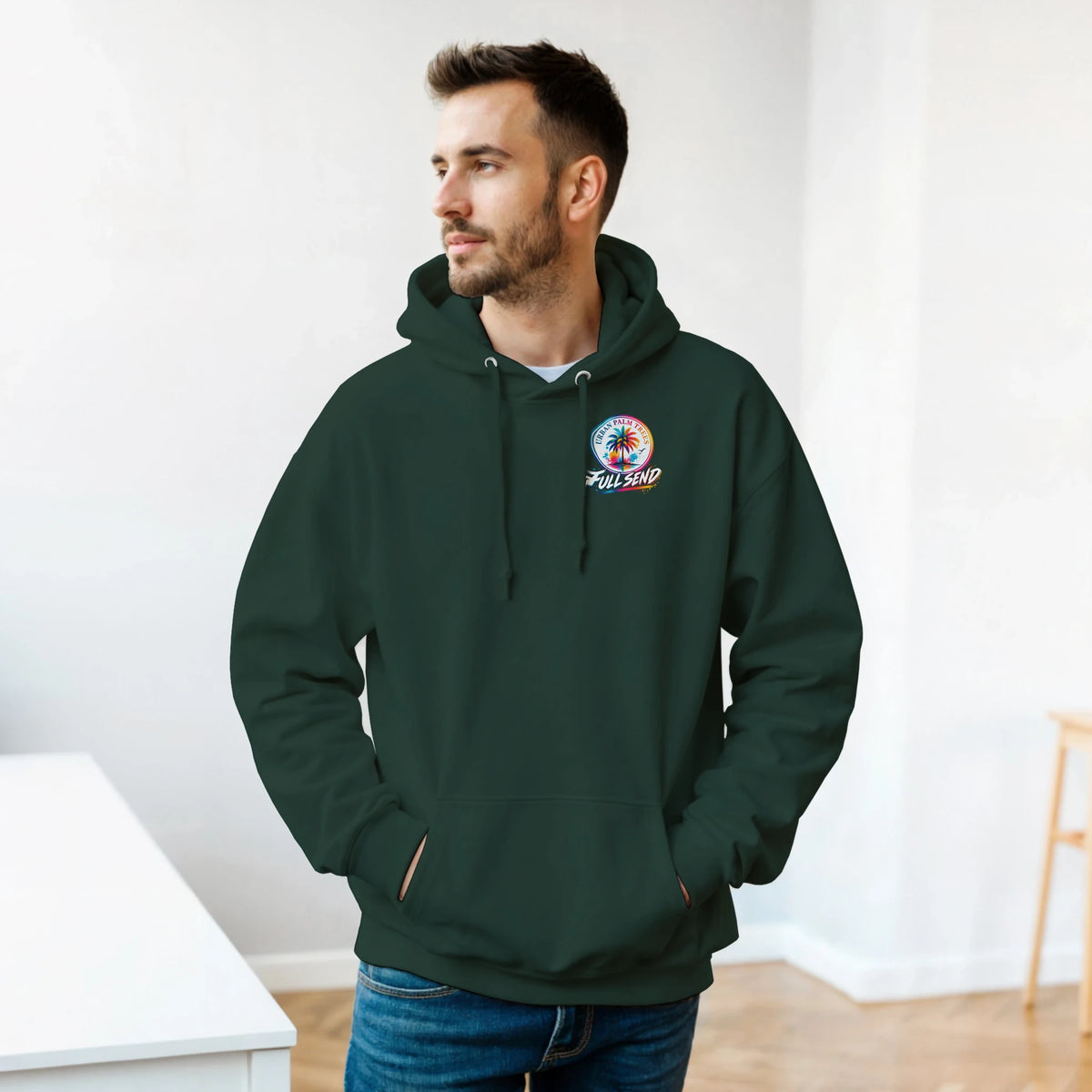 Man wearing dark green Built Not Bought hoodie with Full Send graphic, casual car culture sweatshirt styled with jeans.