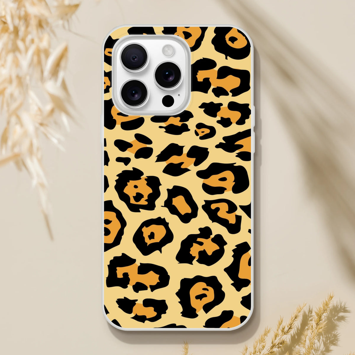Classic leopard print iPhone case for iPhone 13-16 with retro beige background and bold black-and-orange spots.