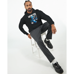 Man wearing black Men's Wanted Teddy Bear Hoodie with blue teddy bear graphic.