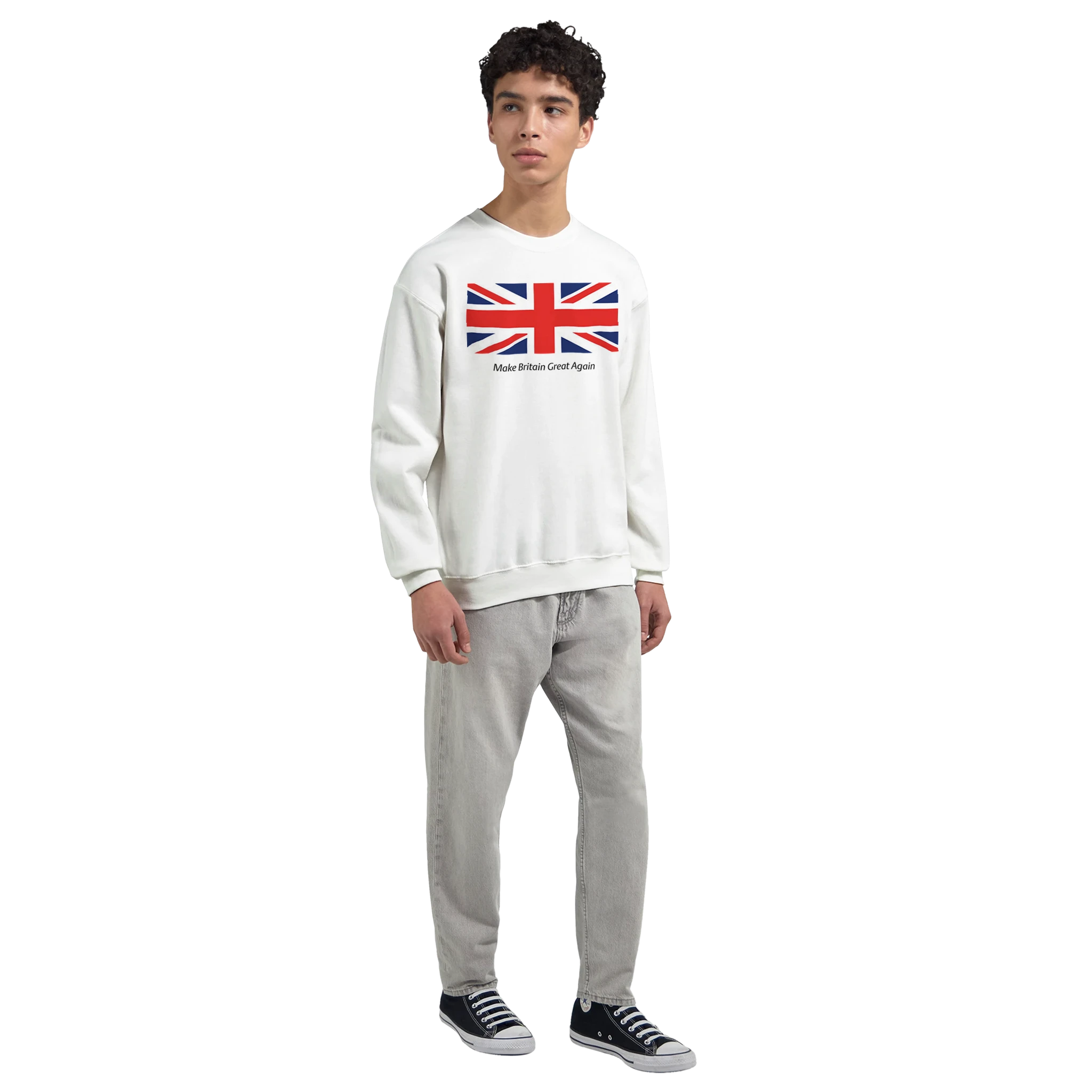 Male model wearing Union Jack Make Britain Great Again graphic sweatshirt with gray jeans and navy sneakers.