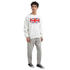 Male model wearing Union Jack Make Britain Great Again graphic sweatshirt with gray jeans and navy sneakers.