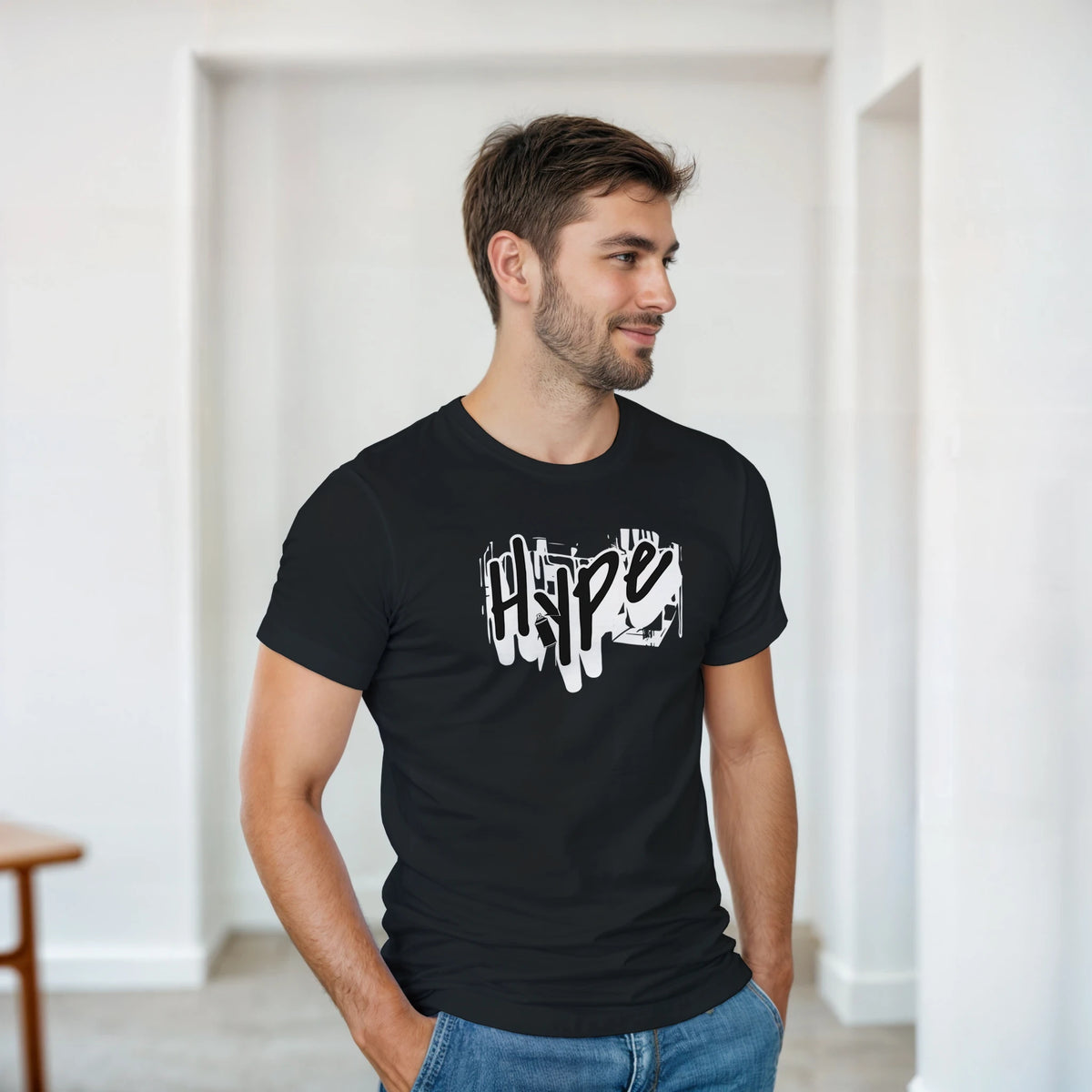 Male model in a black Urban Graffiti graphic T-shirt with white print, casual streetwear look.