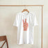 Peace men's graphic T-shirt in white with pink peace-sign typography; heavyweight cotton blend, sizes S-XL.