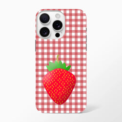 Red and white gingham iPhone case featuring a large cute strawberry graphic on the back for drop protection.