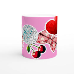 Pink coquette ceramic mug featuring a sticker-style design with a disco ball, heart-patterned bow, cherries, and a red gem heart.