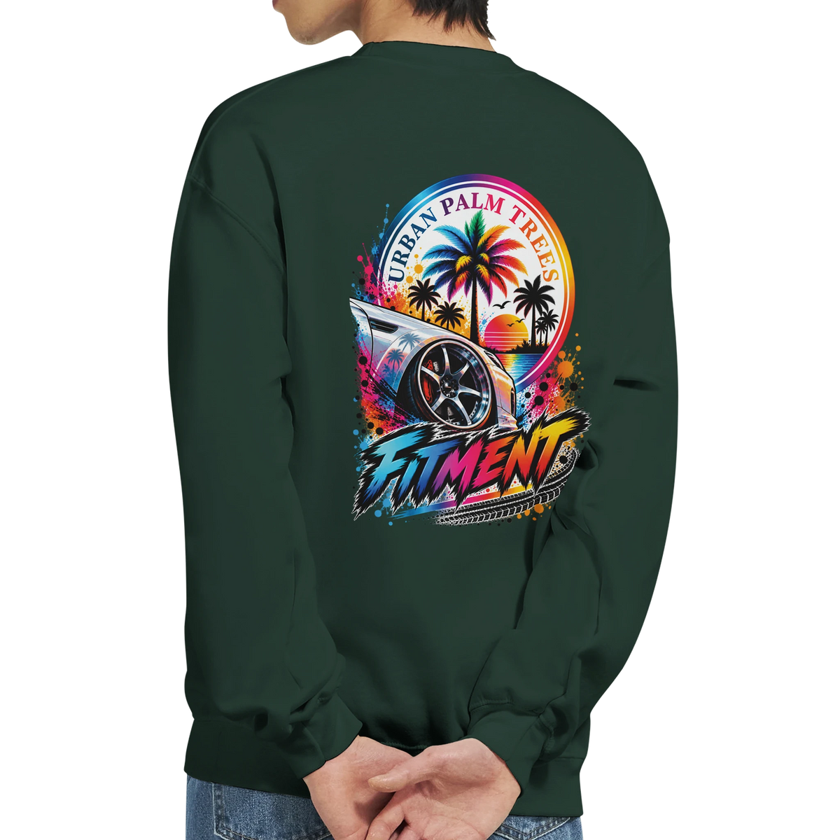 Dark green petrolhead sweatshirt featuring a colorful "Fitment" car graphic with palm trees and a retro sunset design on the back.