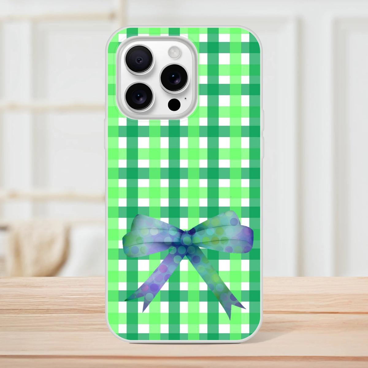 Green Gingham Bow iPhone Case (13-16) in Cute Coquette aesthetic with frosty transparent TPU shell.