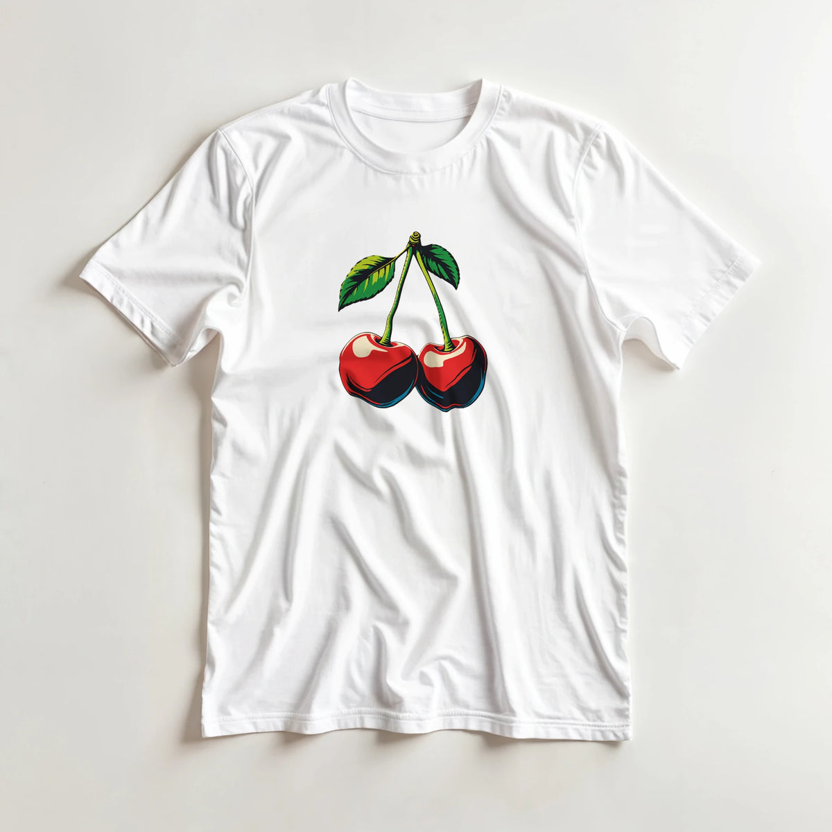 White t-shirt featuring a retro graphic of two red cherries with green leaves and stems.