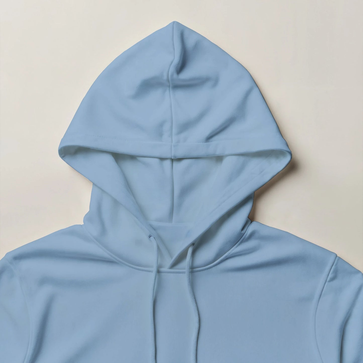 Light blue 50/50 cotton-poly hoodie with a double-lined hood, drawstrings, and front pouch pocket.